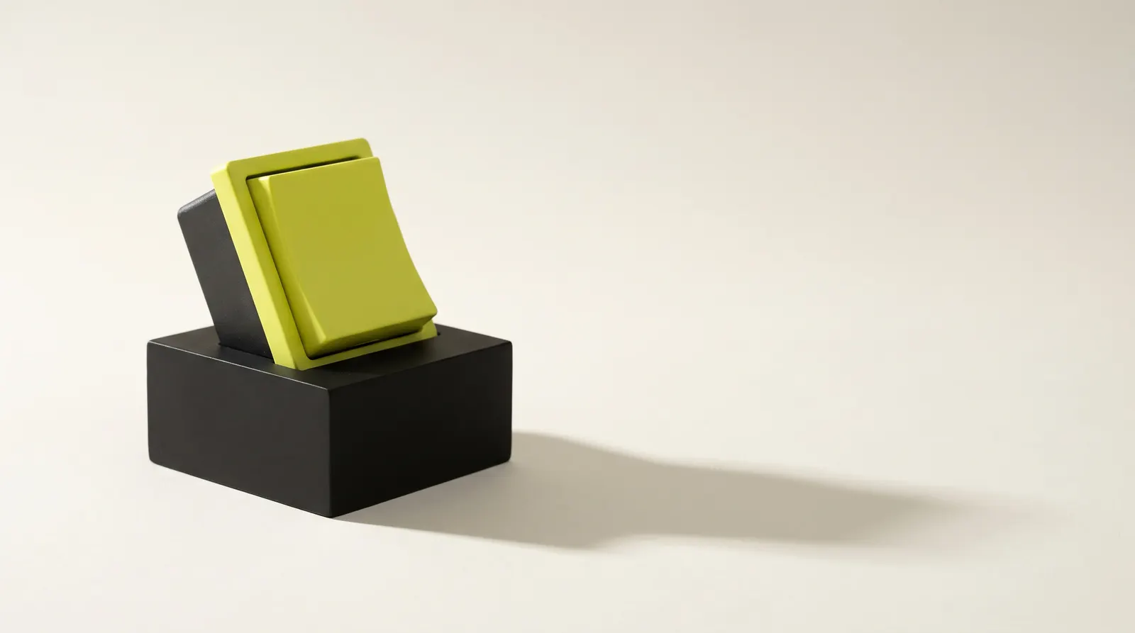 Lime rocker switch with no markings, tilted on a black block, like the language switch on a bilingual site.
